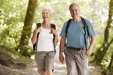 Load image into Gallery viewer, Couple outside on hike wearing OPO t-shirts