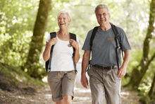 Load image into Gallery viewer, Man and woman walking outside wearing Old People Outdoors T-Shirts | Classic OPO Tee in Granite